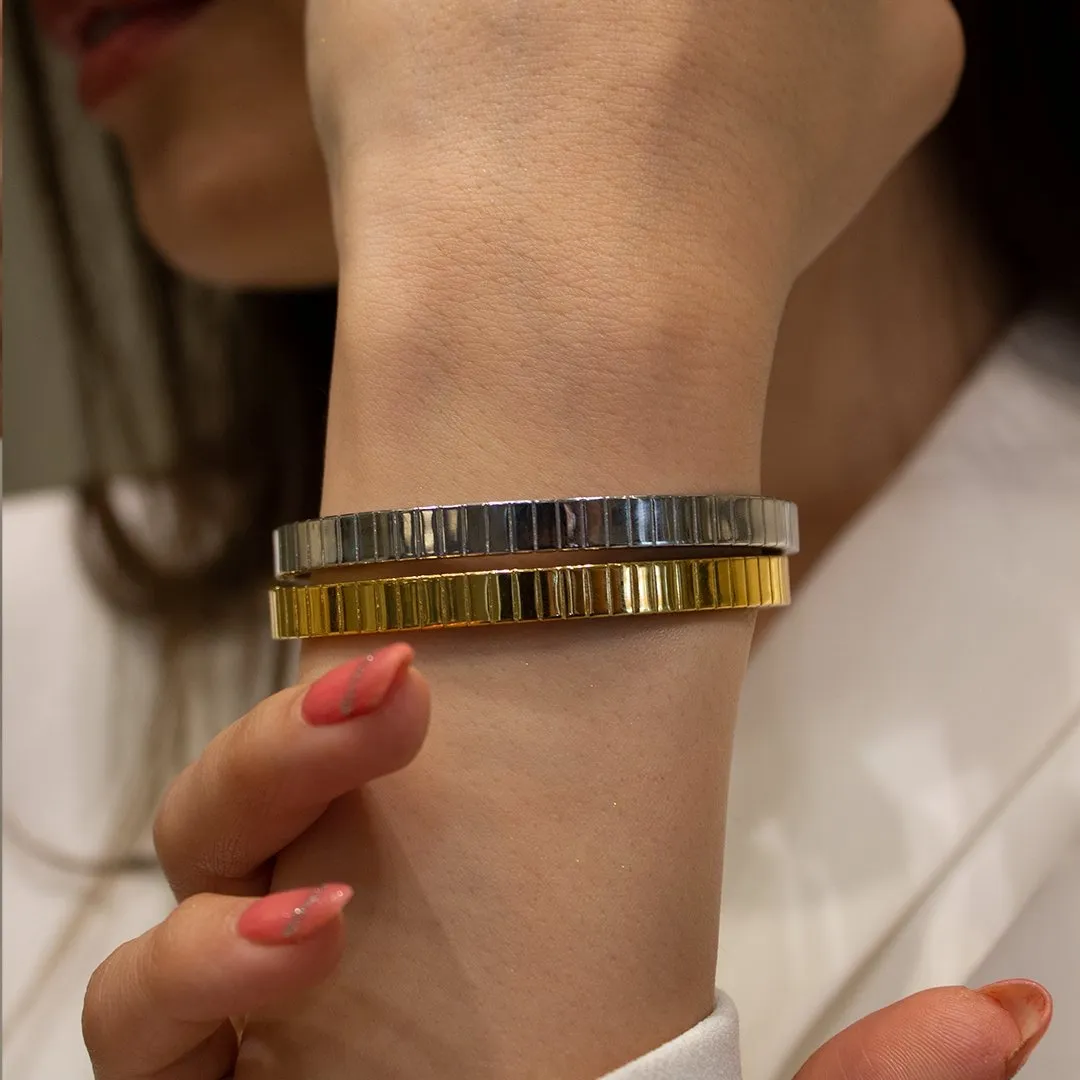 COLLINS GOLDEN BANGLE